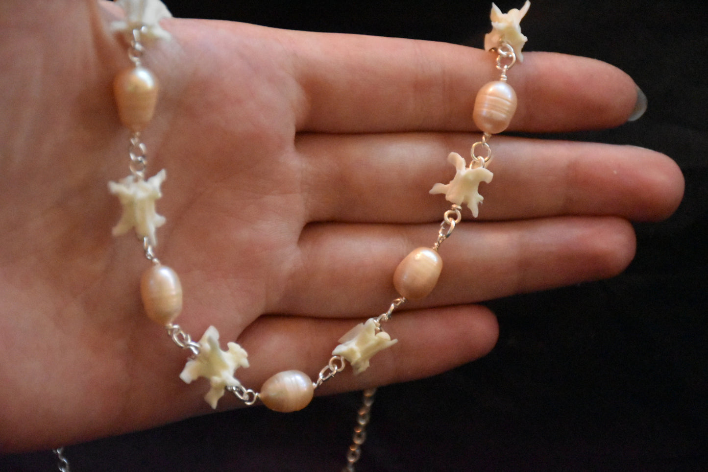 Pink pearl snake necklaces