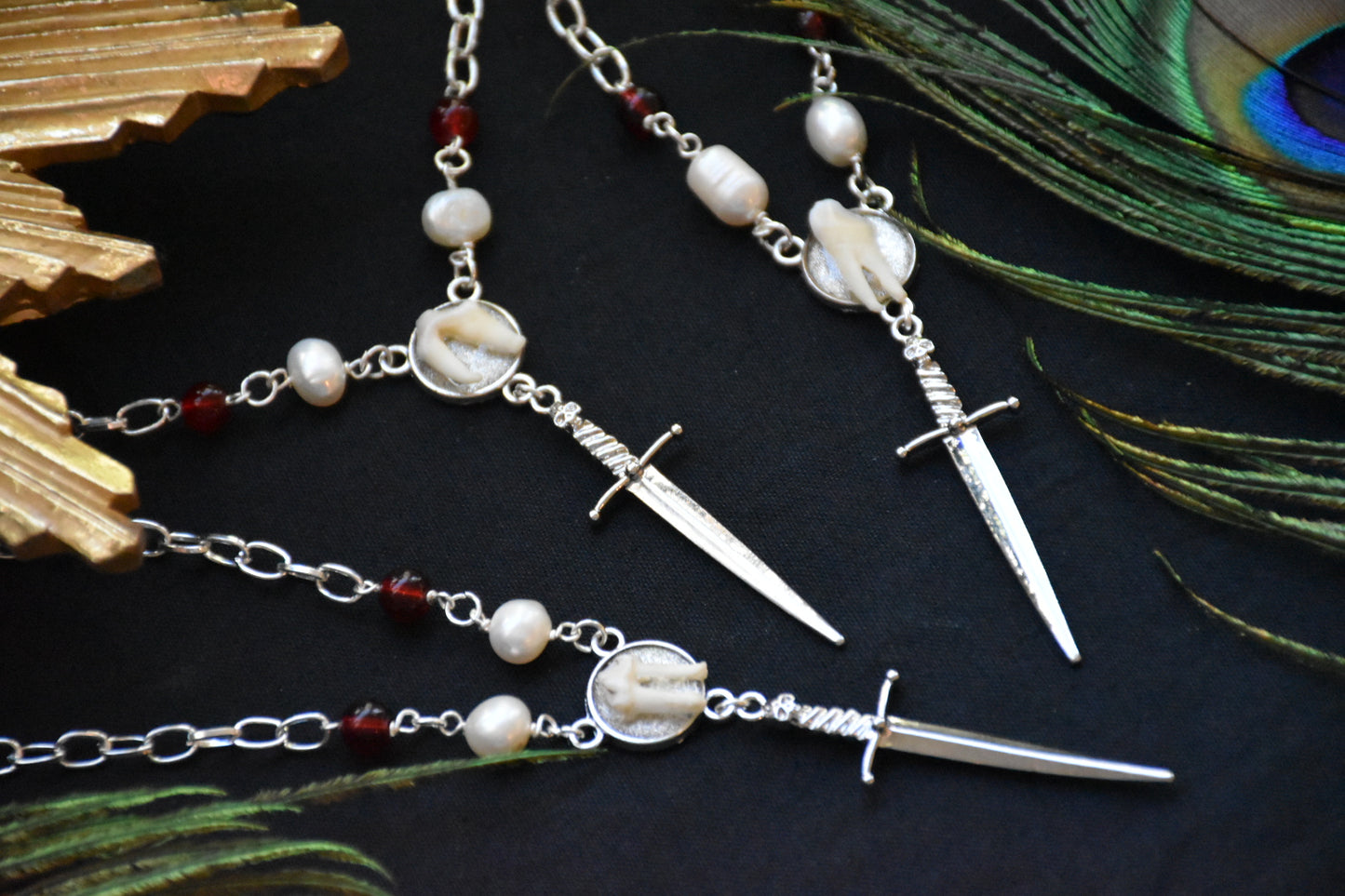 Sword tooth necklaces