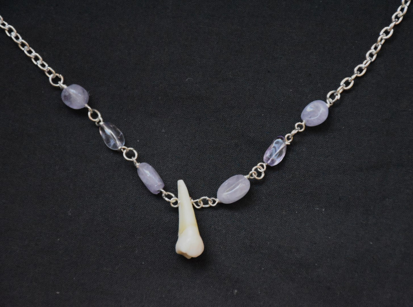 Human teeth necklace