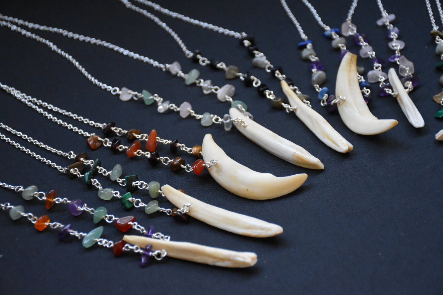 Crystal boar tusk necklaces