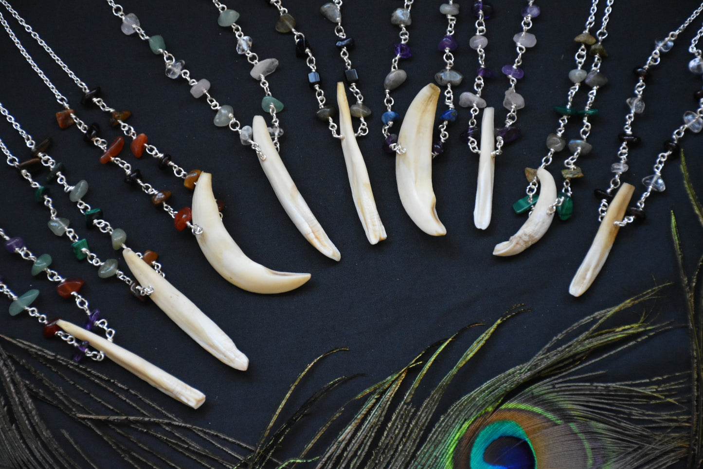 Crystal boar tusk necklaces