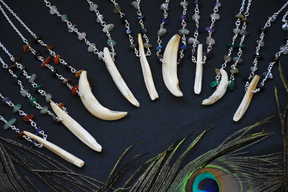Crystal boar tusk necklaces
