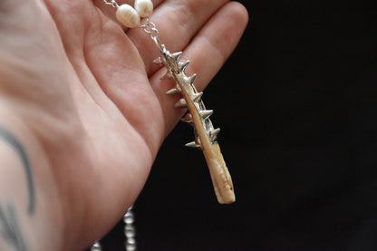Armoured teeth necklaces