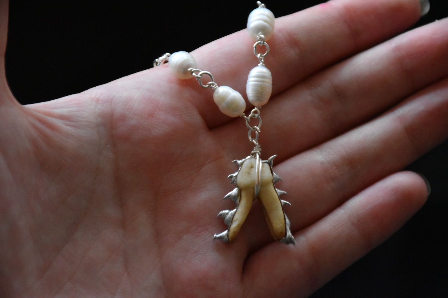 Armoured teeth necklaces