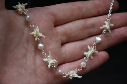 Snake pearl necklaces
