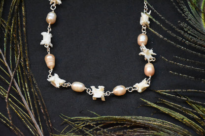 Pink pearl snake necklaces