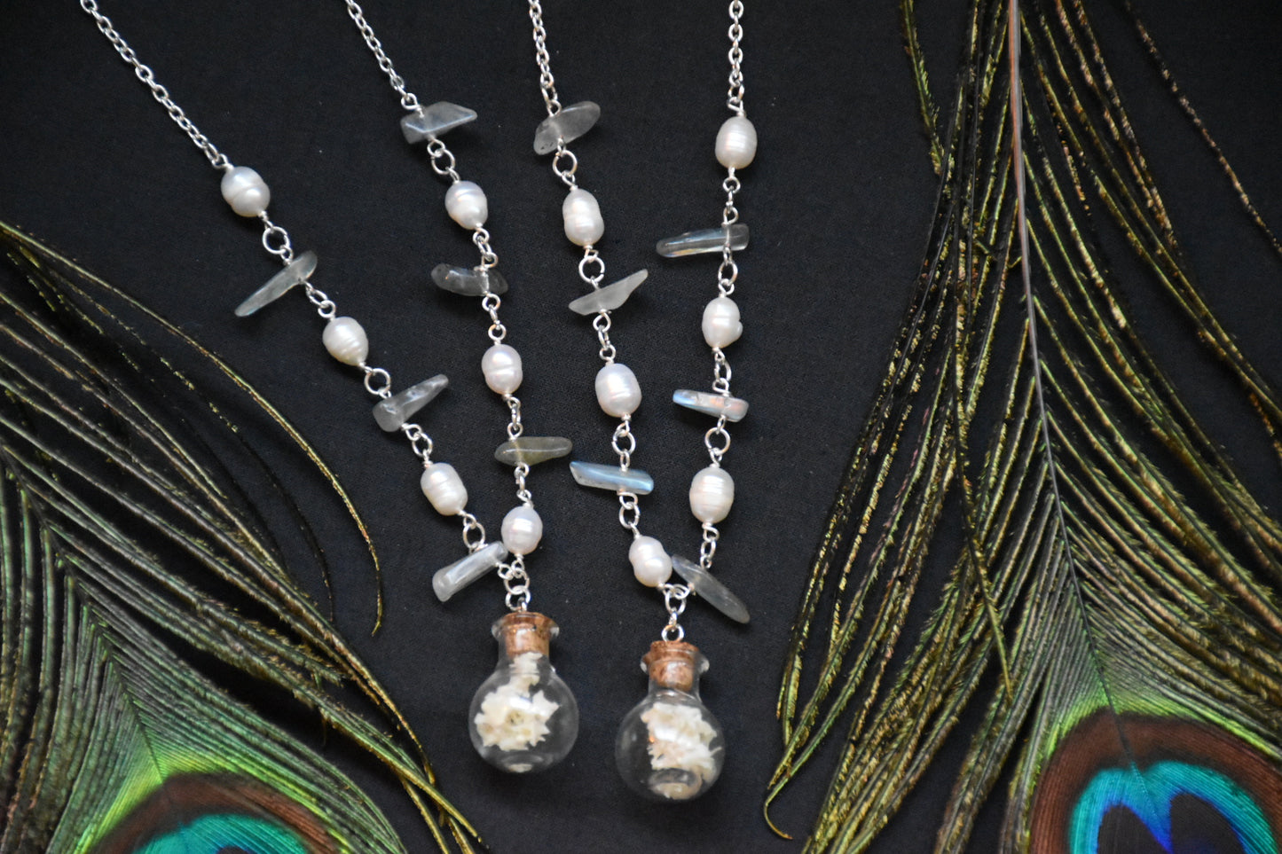 Snake bottle necklaces