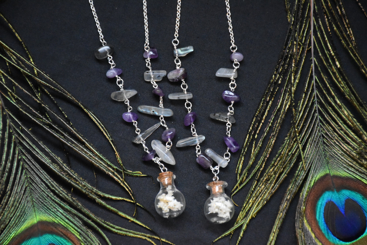 Snake bottle necklaces