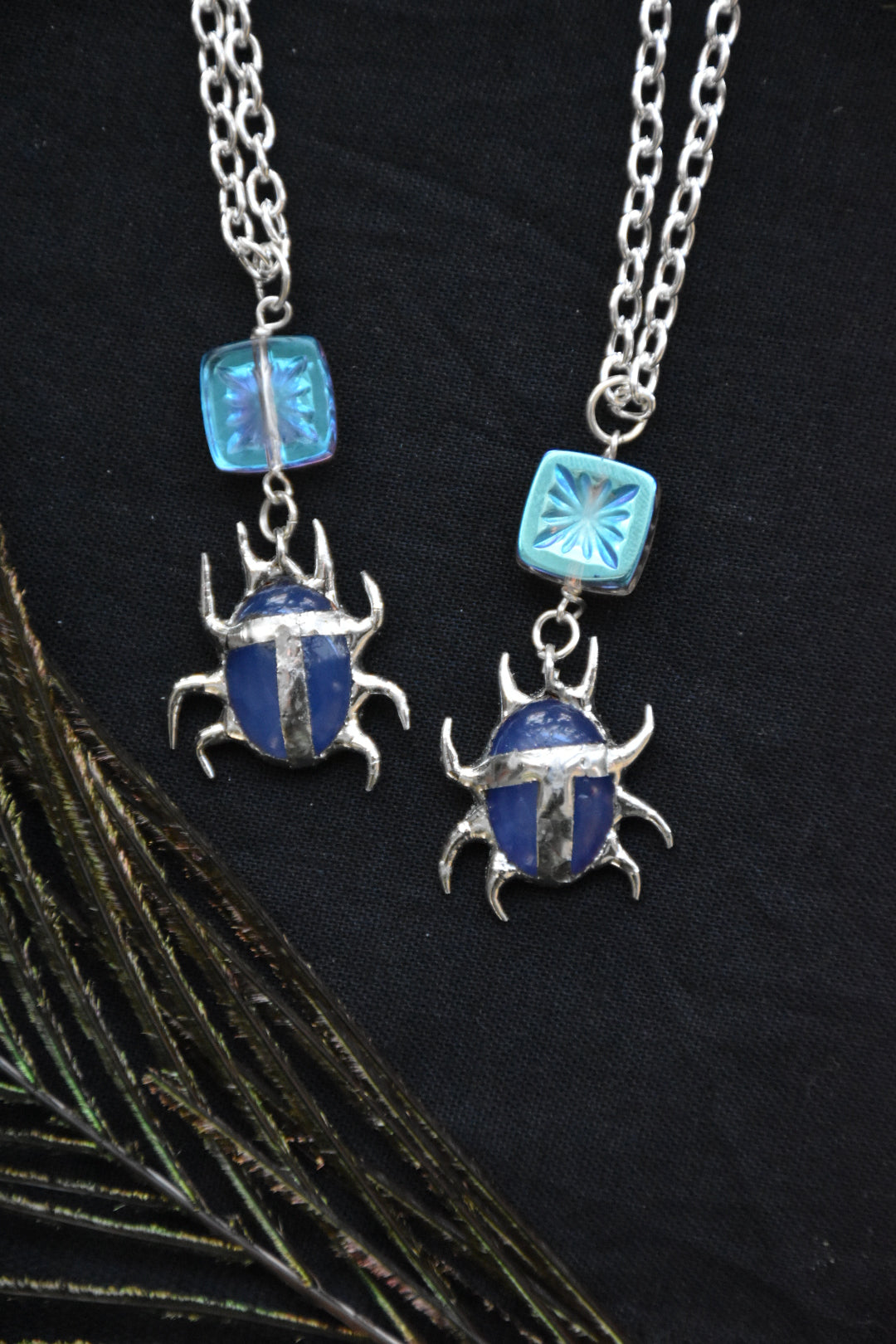 blue crystal beetle necklace