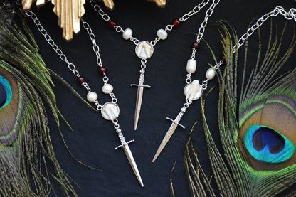 Sword tooth necklaces