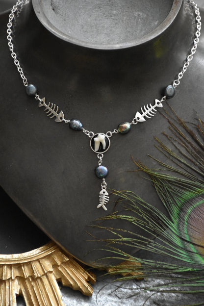 fox tooth fish necklaces