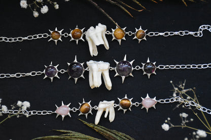 sunshine tooth necklaces