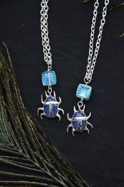 blue crystal beetle necklace