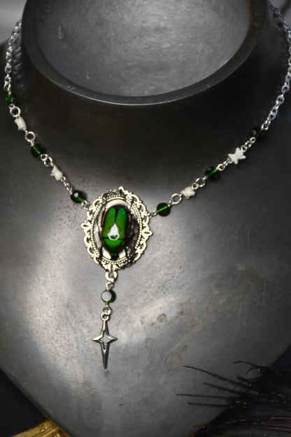 Snake bone beetle necklaces