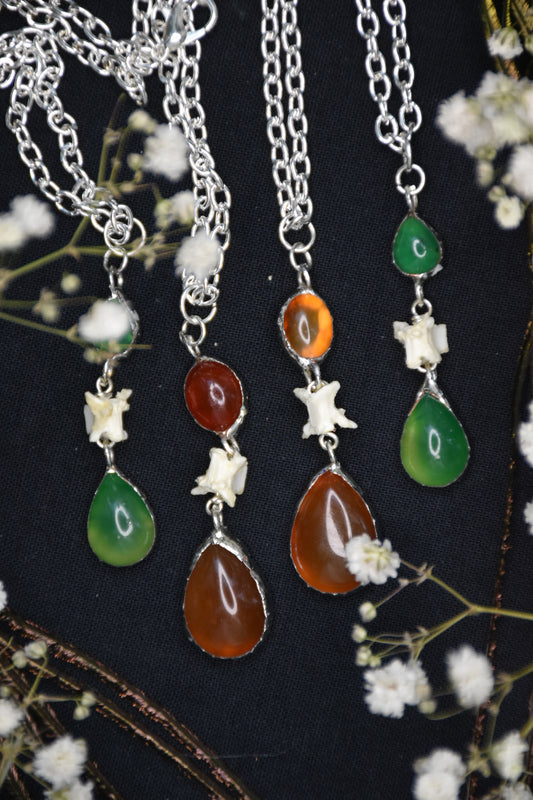 Snake vertebrae crystal necklaces