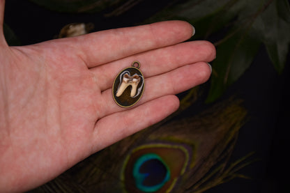 Bronze tooth pendant