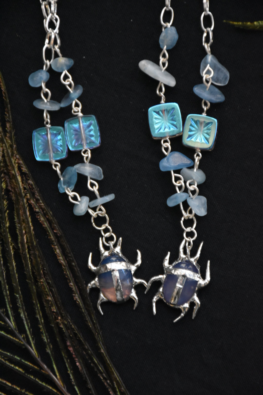 blue crystal beetle necklace
