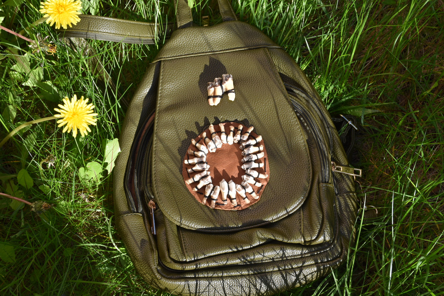 Green tooth backpack
