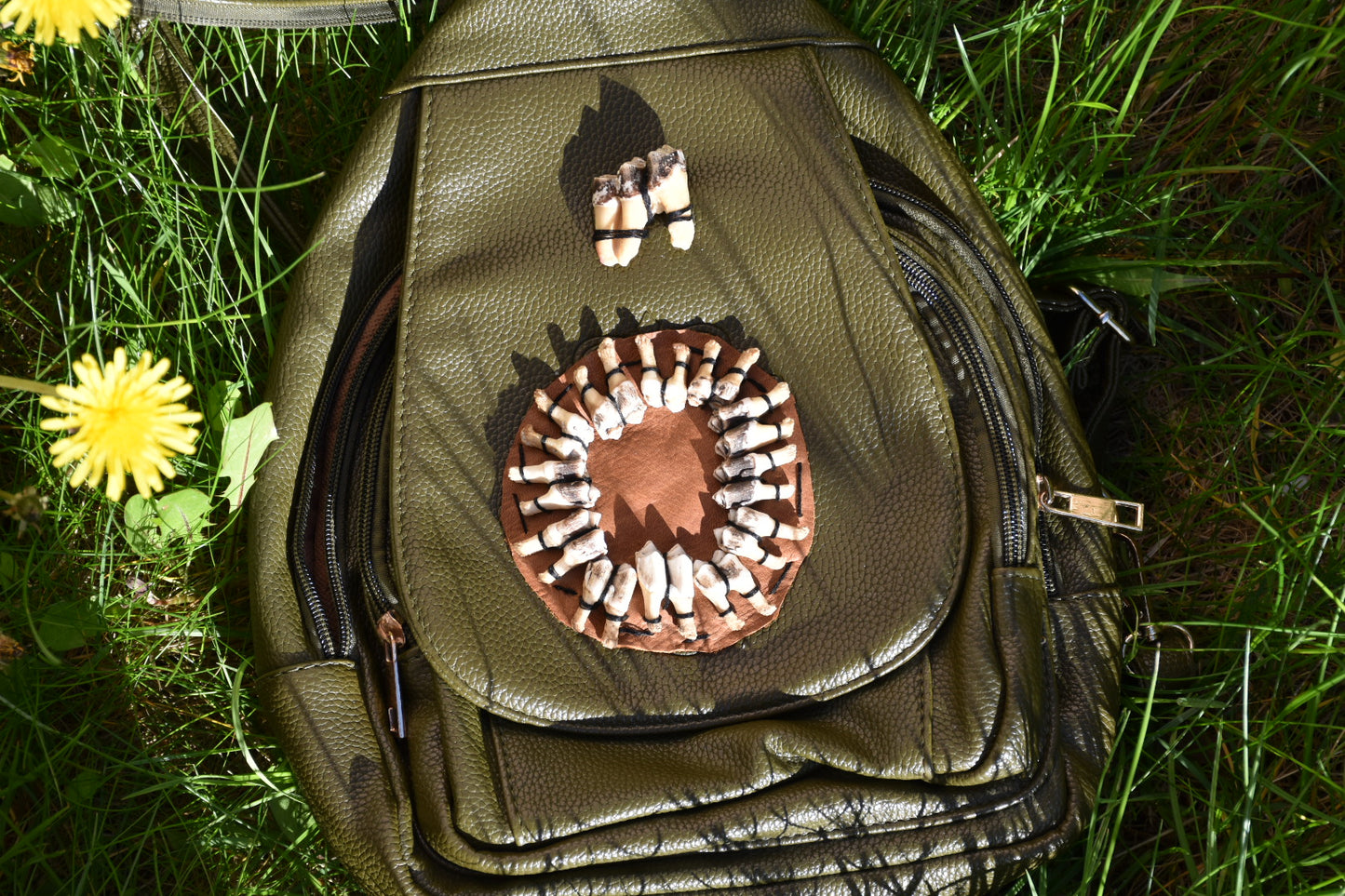 Green tooth backpack