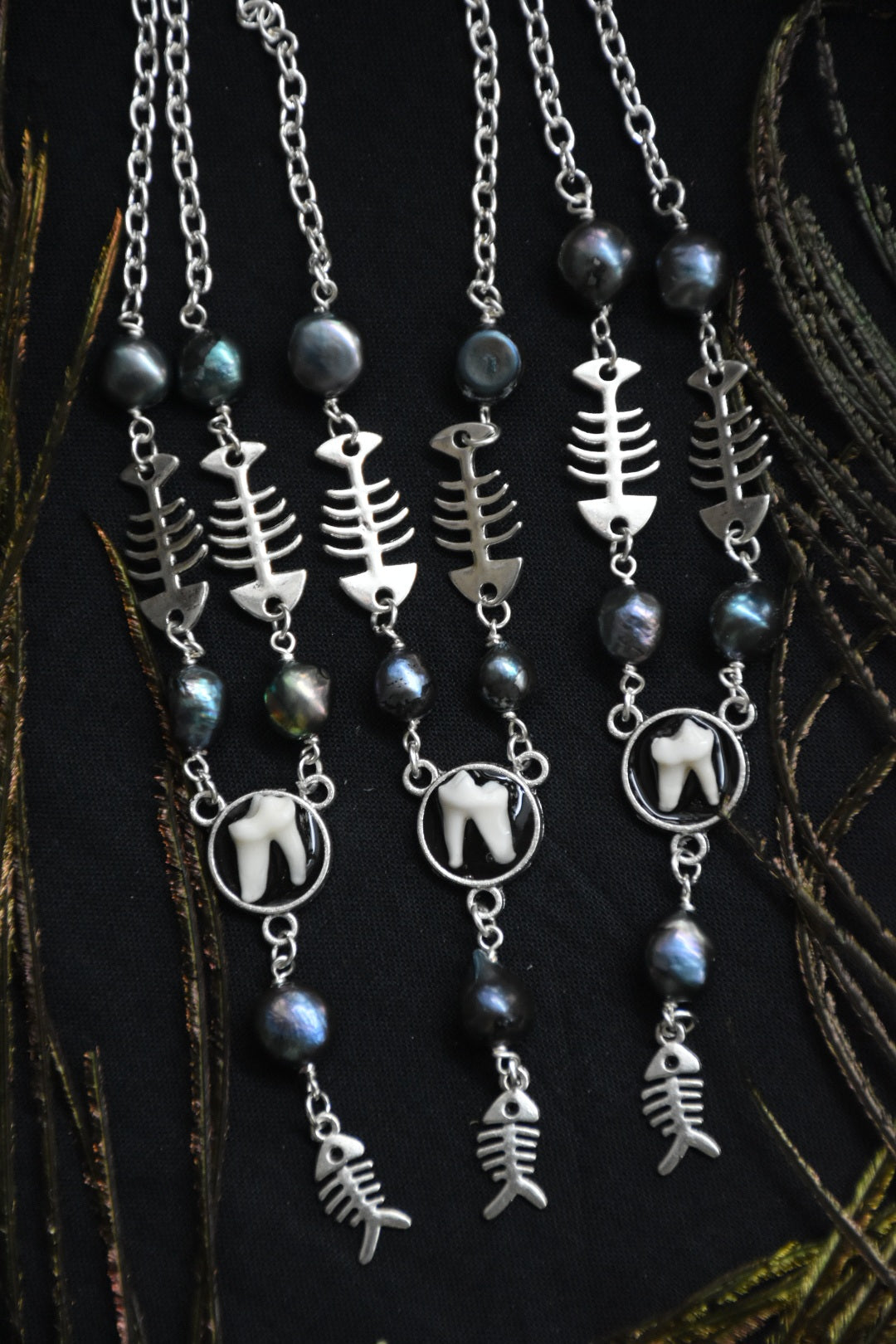 fox tooth fish necklaces