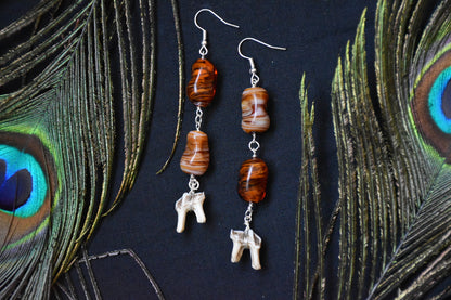 Second hand bead tooth earrings